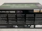 the box of a computer power supply unit is open on the table