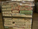 a cart full of newspapers sitting in a warehouse
