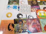 many different types of cds and cds on the table