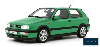 the green car is parked on a white surface with a white background