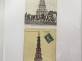 two old postcards on the wall of a building