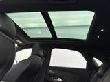 a view of the sunroof from inside of a car