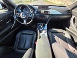 the interior of a car with a steering wheel, dashboard, and dashboard controls