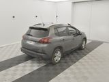 a car that is parked in a room with a checkered floor
