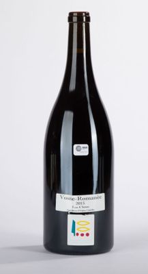a bottle of wine that is sitting on a table