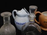 many different types of glass items on the counter