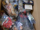 a box full of toys and other items in it
