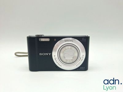 the camera is sitting on the table ready to be used
