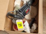 a box with a bunch of stuff in it on the floor
