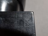 a close up of a black leather wallet on a table