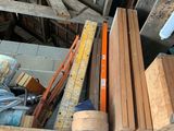 a pile of wood sitting on top of a metal rack