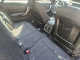 the interior of a car with black leather seats and black trims