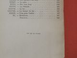 an old book with a list of numbers on it sitting on a table