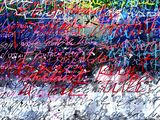 abstract painting of graffiti writing on a wooden surface