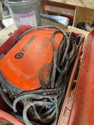 a red box with a bunch of wires inside of it
