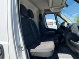 a white van with black seats in the back of it