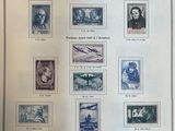 an image of a picture of a collection of stamps on a table