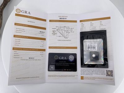 Une moissanite ronde taille brillant pesant environ 2 carats… - Photo 1