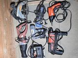 many different types of power tools that are on the floor