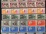a picture of a collection of stamps on a table