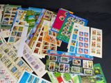 many different types of stamps on the table