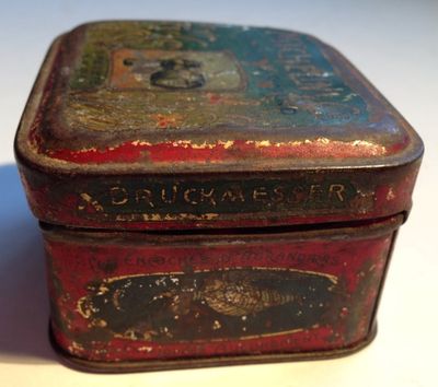 an old tin box with a crackmaster label on it