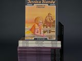 books stacked on top of each other on a black surface