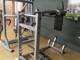 an image of a gym room with equipment on the floor