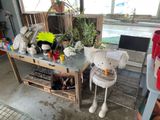 a teddy bear that is sitting next to a table