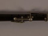 a flute that is sitting on a table