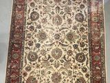 an antique persian rug is on display in a shop