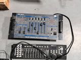 a sound board and a mixer sitting on a table