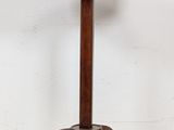 an image of a small table with a metal top on a wooden stand