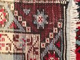 an image of a close up of a rug on a floor