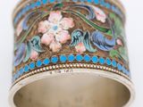 an image of a close up of a ring with flowers on it