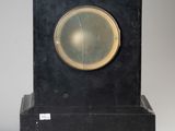 a black clock with a gold face on a white background