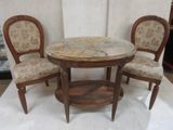 three chairs and a table with a marble top
