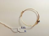 a close up of a bracelet with a price tag attached to it