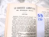 un livre sur lequel est posé un morceau de papier