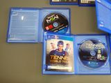 a lot of blu - rays that are on the table