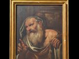un vieux tableau représentant un homme barbu, avec une barbe blanche