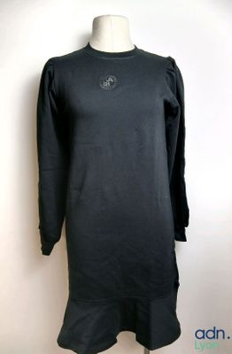 black long sleeved dress on a mannequin mannequin mannequin mannequin mannequin mannequin mannequin mannequin mann