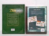 a green book with a picture of the legend of zeldan on it