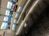 an image of a large metal object inside of a building