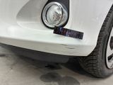 a close up of a car ' s bumper with a sticker on it