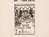 a black and white book with a picture of a man in a chair