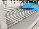 an image of a machine that is working on a sheet of paper