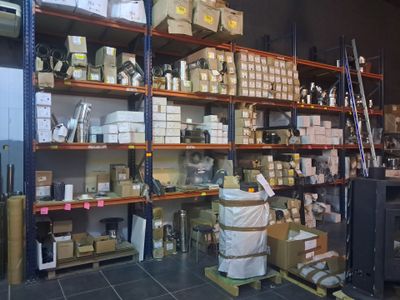 many boxes and boxes on the shelves in the warehouse