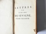 someone is holding a book open to a page with the title let tress de madame des sevigne
