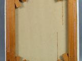 an old picture frame with a piece of wood sticking out of it